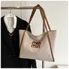 Bolso de mano grande estilo retro coreano para mujer, nuevo estilo Otoño e Invierno 2025, bolso de hombro simple casual, bolso de axila de alta gama