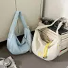 Bolsa Deportiva Transfronteriza para Ciclismo para Mujer 2025 Nueva Bolsa Tipo Bollo Gran Capacidad Tela de Nylon Bolso Cruzado Bolso Pequeño Fresco para Hombro