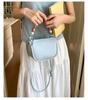 Bolsas para Mulheres 2026 Verão Novo Design de Nicho Bolsa de Mão de Luxo Bolsa Simples Versátil Bolsa de Ombro Transversal