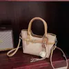 Bolso tote de hombro vintage de gran capacidad para mujer, bolso cubo de hombro de moda para el verano 2026, elegante bolso de axila