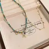 Conjunto de Colares com Pingente de Estrela e Lua em Contas de Vidro Retrô Nicho Luxo Leve Toque de Alto Padrão Corrente para Clavícula Gargantilha Exquisita