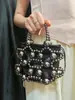 Bolsa Pequeña de Verano 2025 Nuevo Estilo Bosque Chica Suave Moda Hueca Pequeño Aroma Alto Grado Elegante Acrílico de Mano Tejida