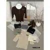Solo Uno VI+2026 Otoño Temprano Estilo Minimalista Coreano Versátil Ajustado Cuello Redondo Manga Media Suéter de Punto para Mujer 98833