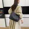 Bolsa tote casual de grande capacidade com blocos de cor, nova coleção primavera/outono 2026, adequada para o dia a dia, com um design estiloso e texturizado