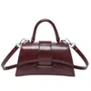 Versátil bolso pequeño cuadrado para mujer, nuevo y moderno 2026, mini bolso de mano simple para el día a día, bolso de hombro cruzado de lujo ligero a la moda