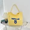 Saco de lona de grande capacidade Mulheres estilo preguiçoso Bolsa de livro de estudante Carta saco de ombro Grande capacidade artística Tote Bag bolsa