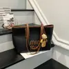 Bolso grande de mujer retro transfronterizo 2026 nueva moda versión coreana bolso tote de nicho para viajes bolso simple de axila
