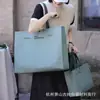 Bolsa de Mão TNT Espessa Verde Qingshan Bolsa Tridimensional Bolsa de Loja de Roupas Bolsa de Presente Publicitária Personalizada com Logo