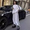 Conjunto Listrado de Algodão Estilo Hong Kong para Mulheres Verão Transfronteiriço Novo Solto Fashion Calças de Manga Curta Estilo Esportivo Conjunto de Duas Peças Moderno