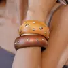 Pulsera Geométrica Redonda de Madera China Retro con Remaches de Estrella Joyería de Mano Elegante de Gama Alta Simple de Nicho de Moda para Mujeres