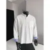 En stock: Nueva camisa de otoño 2026 para hombre, de alta gama, con retazos a cuadros, cuello alto, corte holgado, talla grande, top moderno
