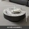 Mesa de centro minimalista de pizarra de lujo ligero italiano Mesa de té de vidrio para sala de estar de apartamento pequeño moderno Mesa de té de vidrio para el hogar Combinación de mesa de centro redonda grande y pequeña