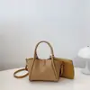 Bolso de Mano Versátil Texturizado para Mujer 2025 Nueva Moda Simple de Alta Gama Bolso de Hombro Elegante para Ir al Trabajo Bolso Balde