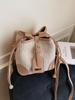 Bolso Tejido para Mujer 2025 Verano Nuevo Estilo Juego en la Orilla del Mar Viaje Diario Bolso de Cubo Moderno Nicho Versátil Bandolera Bolso de Paja