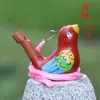 Puesto de viaje de pájaro acuático de arena púrpura Yuerui silbato de animal creativo decoración de pájaro silbato de cordón de cerámica lugar escénico Memorial