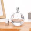 Venta al por mayor de fábrica botella de perfume de vidrio blanco fino de 75 ml botella de perfume redonda botella de spray hidratante botella vacía