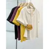 Ropa de verano transfronteriza para mujer de talla grande, cuello en V adelgazante, camiseta de manga corta de color liso con botones talla grande, top versátil de hombro normal para mujer, corte ajustado