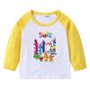 2026 Nova Camiseta Infantil Transfronteiriça Primavera e Outono Gola Redonda Desenho Animado Manga Longa Camisa Básica para Meninos e Meninas Camiseta de Algodão para Bebê