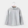Versão coreana de camisa base de algodão escovado de gola alta para crianças meninos e meninas casaco base de algodão não desbota e não faz bolinhas