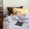¡Estilo blogger! Juego de cuatro piezas de algodón puro lavado con bloques de color, sábana a rayas, juego de decoración suave de tres piezas para dormitorio estudiantil