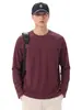 Camiseta de manga larga con cuello redondo para hombre, nuevo estilo primavera/otoño 2026, diseño retro japonés de moda, color liso, diseño estructurado con detalles de patchwork
