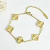 Pulsera de Acero de Titanio Trébol de Cuatro Hojas de la Suerte, Collar Grabado a Láser por Doble Cara, Aretes de Flor, Anillo de Cinco Flores, Venta al por Mayor, Venta Caliente Transfronteriza