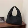 Bolso bandolera versátil de gran capacidad para mujer, bolso tote de lona casual a la moda, bolso casual para debajo del brazo estilo 2026 nuevo