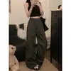 Foto real de los nuevos pantalones cargo de otoño 2026 con cintura elástica personalizada y cordón, bolsillos grandes, pierna recta, puños para mujer 19655