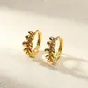 Arete de personalidad popular transfronterizo de cobre incrustado con circón, moda europea y americana, hebilla de oreja para perforar de comercio exterior, uso irregular, venta al por mayor