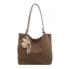 Bolso tote fresco de moda para mujer de este año, nuevo estilo otoño 2026 bolso de hombro chic de lunares, bolso para el antebrazo para ir al trabajo