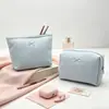 Nuevo Neceser con Lazo de Patrón de Gofre, Dulce y Fresco, Bolso de Mano de Gran Capacidad, Bolsa de Almacenamiento para Viajes y Negocios, Transfronterizo