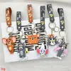 Chaveiro de pelúcia Tom e Jerry desenho animado gato Tom e rato Jerry decoração de mochila pequeno presente boneca de caixa surpresa
