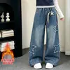 Pantalones Vaqueros de Retazos con Estrellas para Niñas 2026 Otoño/Invierno Nuevo Estilo Pantalones Rectos de Pierna Ancha Versión Coreana para Estudiantes de Secundaria y Mayores