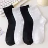 Calcetines para mujer otoño e invierno calcetines de felpa calcetines de tubo a rayas Maillard calcetines de tubo estilo japonés y coreano ins calcetines de estudiante Joker al por mayor