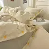 2026 Novo Conjunto de Roupa de Cama de Algodão Lavado Conjunto de Quatro Peças Estilo Muji Listrado Botão Tecido Colorido Jacquard Casa Quarto Conjunto de Quatro Peças