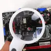 Nueva lupa de plástico de mano para lectura con doble lente, dos aumentos y 4 luces LED, raqueta 6B-6B