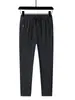 Nuevos Pantalones Casuales de Verano de Seda Helada Versátiles de Talla Grande Sueltos con Tobillo Ajustado Marca de Moda Secado Rápido Deportivos para Hombre Pantalones Rectos