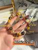 Qiaoen Citrina Natural Citrina Citrina Citrina Ojo de Tigre Dorado Goldba Diseño Versátil Pulsera de Cristal DIY Venta al por Mayor