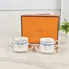 Venta Directa Transfronteriza Cadena de Hierro Azul Taza de Café y Platillo de Porcelana Fina Estilo Inglés, Juego de Regalo de Taza de Té de Cerámica Simple de Lujo Ligero para Regalar