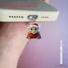 Tapón de polvo para teléfono móvil 2D, colgante acrílico de gatito transfronterizo, colgante de Tipo C enojado, artículo de venta caliente, otros productos africanos