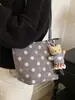 Bolso de gamuza vintage de nicho para mujer para otoño e invierno, nuevo bolso de hombro casual para el día a día 2026, bolso de mano tipo cubo