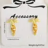 Brincos de cenoura tridimensionais da moda, campeões de vendas transfronteiriços, nicho, versáteis, com design de coelho personalidade, joias de brincos requintadas