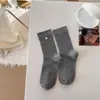 Calcetines de Mujer Estilo Coreano con Botones de Flores Pequeñas, Calcetines de Micro Presión Nuevos Otoño e Invierno, Calcetines sin Costuras de Media Pantorrilla, Color Sólido, Calcetines Slouch Simples Versátiles