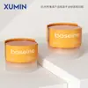 Xu Min en stock Botella de Crema Exfoliante de 150G con Cuchara Pinzas de 50G Botella de Crema para Ojos Sub-empaque de Cosméticos