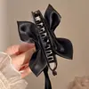 Elegante pinza para el pelo con lazo en la nuca, pequeña pinza tipo banana de malla de encaje estilo Chanel, pinza negra para peinado semi-recogido para mujer