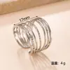 Anillo Popular de Acero Inoxidable Resistente al Desgaste Simple Moderno Diseño de Línea de Presión de Aceite Corona de Anillo Anillo para Dedo Fabricante