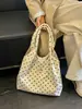 Bolso tote de gran capacidad para mujer, estilo nuevo, bolso de hombro versátil, elegante y atractivo, adecuado para ir al trabajo y salir