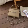 Bolso de Mano de Lujo Ligero Estilo Coreano para Mujer 2026 Primavera Nueva Moda Bolso de Hombro para el Trabajo Bolso Cruzado Elegante de Color Sólido para Mujer