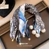 Bufanda de seda de lujo ligero estilo francés con colgante de perla y cadena de collar magnética, cadena de bufanda casual simple y a la moda con diseño único