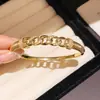 Pulseira vazada com corrente de zircônia de design minimalista, moderna e requintada, versátil e elegante, toque de luxo leve e alta qualidade, joia feminina
